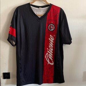Black and Red Jersey with V-Neck and Bold Stripe